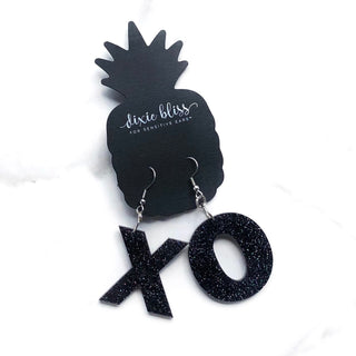 XO Dangle Earrings in Black Party Glitter